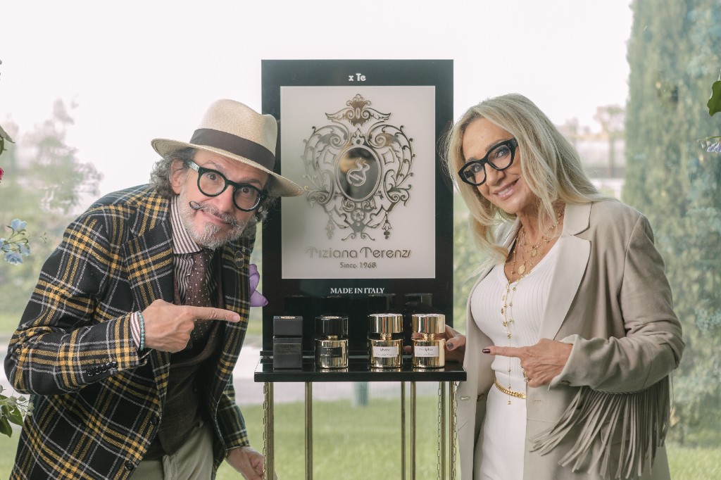 Tiziana Terenzi and Paolo Terenzi with a Tiziana Terenzi perfume display